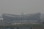 Smog surrounds the Bird's Nest, the Beijing National Stadium built for the 2008 Olympics. Photo courtesy of A. Aruninta.